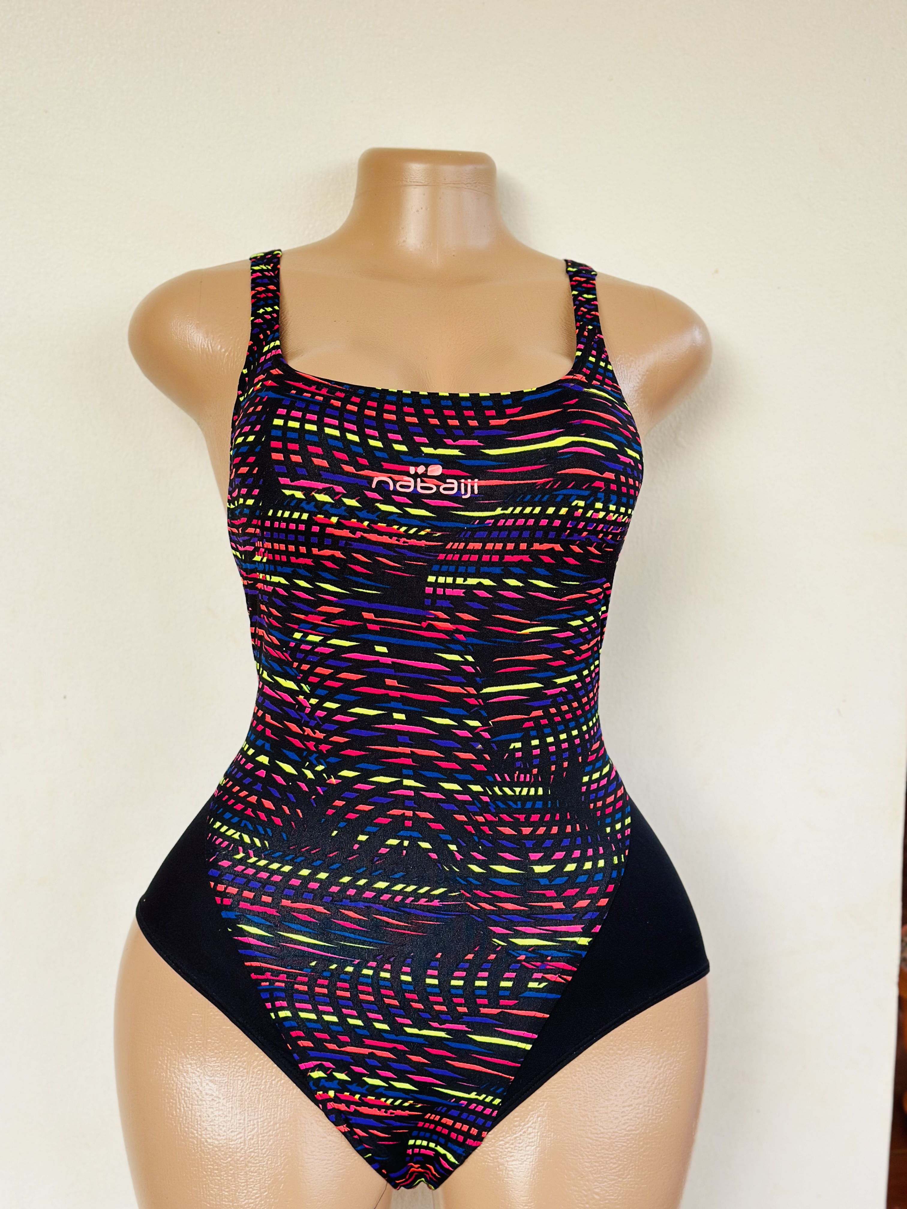 Swimsuit (One Piece in black dotted in red, blue and green)