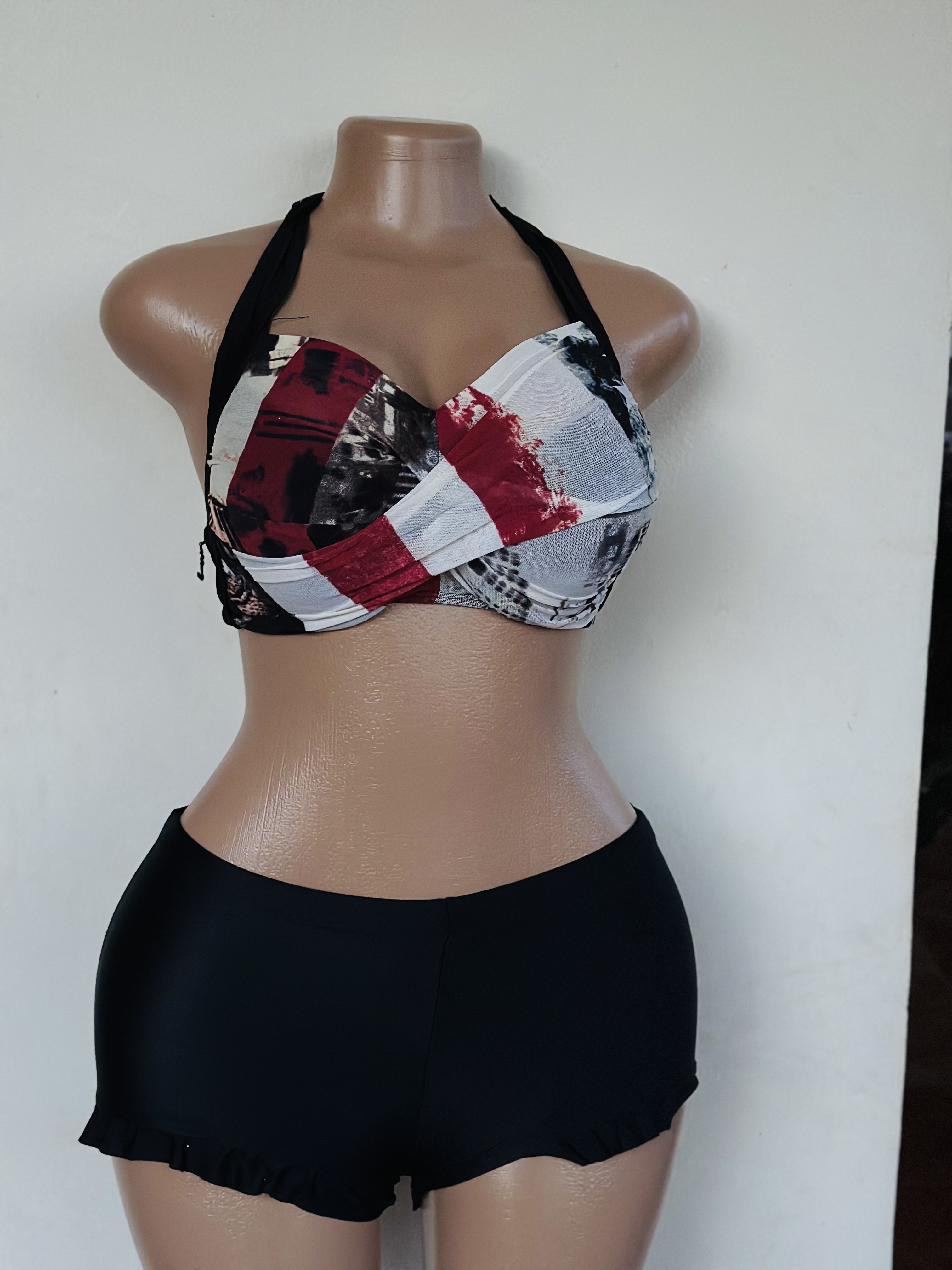 Bikini (Black top with shades in black, grey and white and a black bottom)